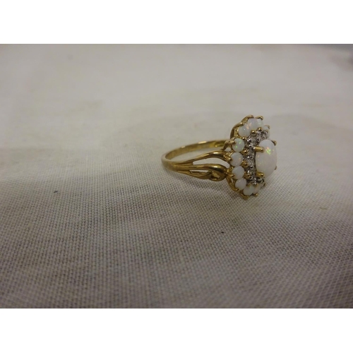 236 - Ladies 9ct gold opal and diamond ring. Size N/O.