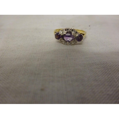 238 - Ladies 18ct gold diamond and amethyst ring. Size K.