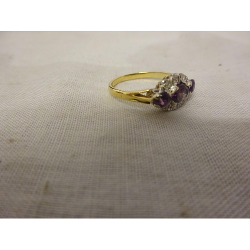 238 - Ladies 18ct gold diamond and amethyst ring. Size K.