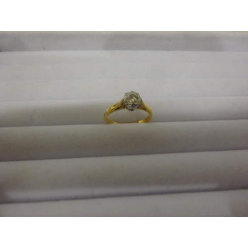 239 - Ladies 18ct gold single stone diamond ring. Size N.