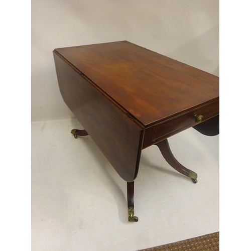 243 - Georgian mahogany drop leaf Pembroke table fitted with a drawer and raised on twin column support wi... 