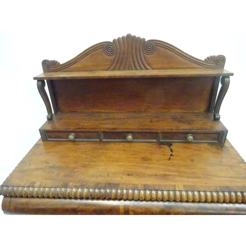 245 - A Cork Regency mahogany and rosewood cross banded side cabinet, the upper section having carved gall... 