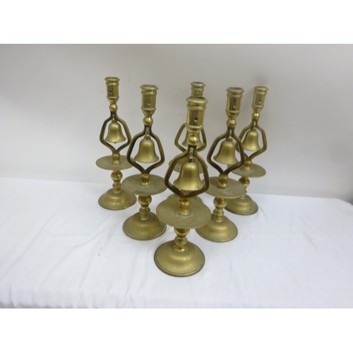 251 - A rare set of 6 antique brass bell candlesticks.