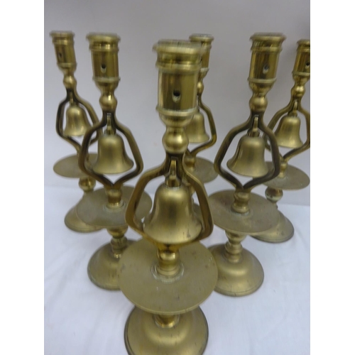 251 - A rare set of 6 antique brass bell candlesticks.