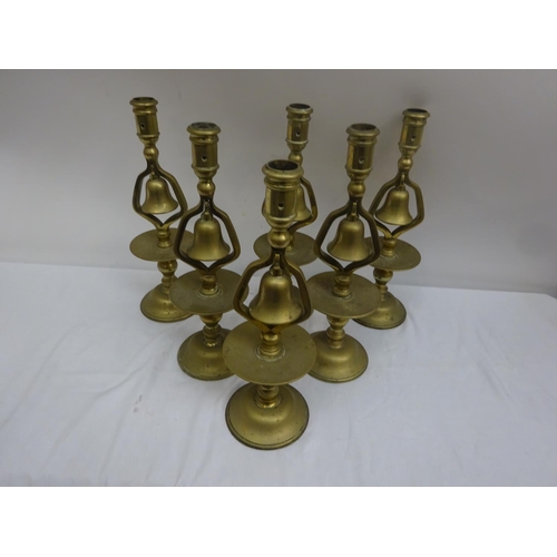 251 - A rare set of 6 antique brass bell candlesticks.