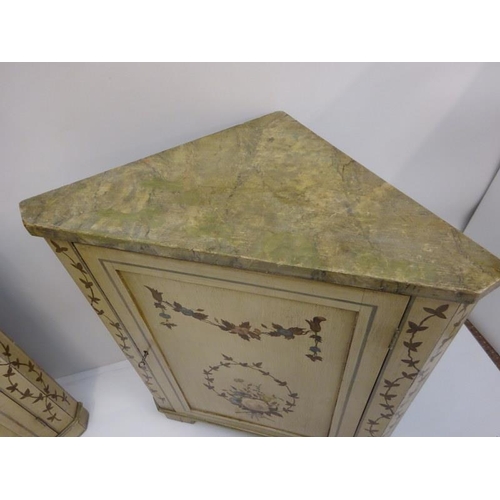 268 - A pair of antique painted corner cabinets with marble effect tops. W. 70cm, H. 85cm approx.