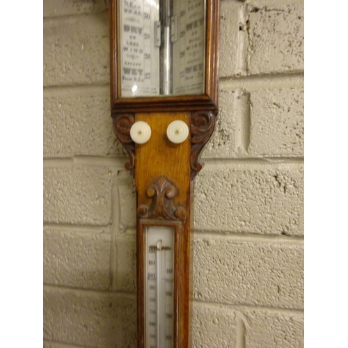 295 - Good antique carved oak cased Admiral Fitzroy mercury barometer and thermometer. L. 104cm approx.