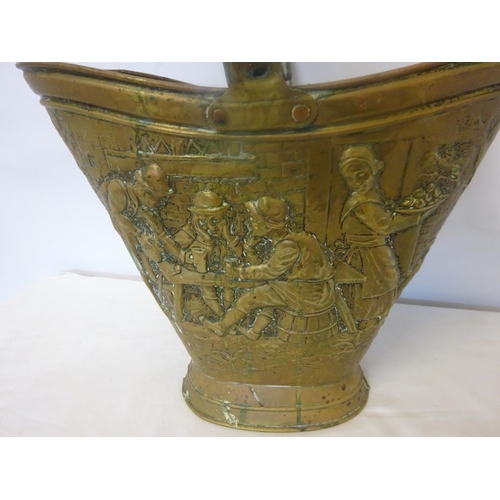 36 - Antique continental brass coal bucket embossed with figures in a travern.