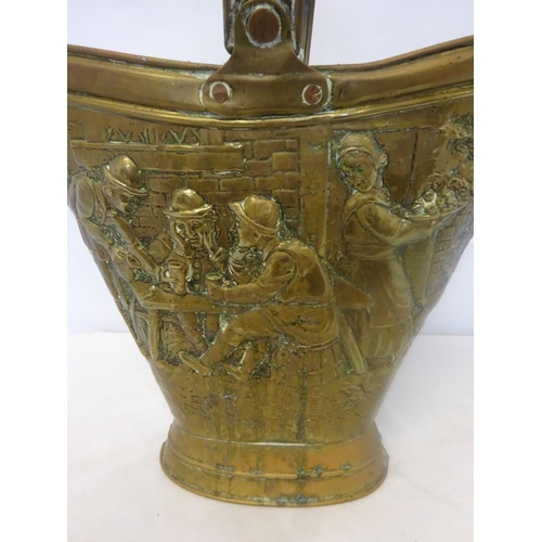 36 - Antique continental brass coal bucket embossed with figures in a travern.