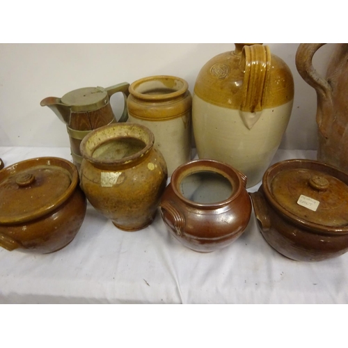 363 - Large old pottery vessel and lid together with a pair of pottery jars and lids, etc.