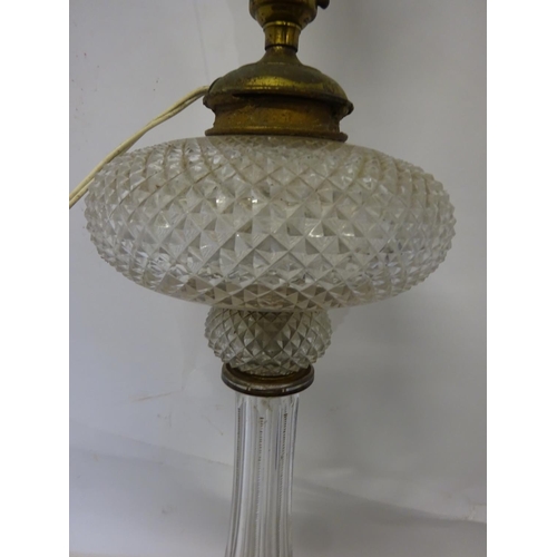 38 - Antique cut glass oil lamp now electrified on circular base. Over all height 82cm.