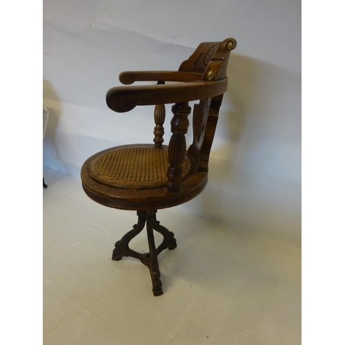 40 - Antique oak swivel ships chair on metal base, possibly from R.M.S Celtic which went up on the rocks ... 