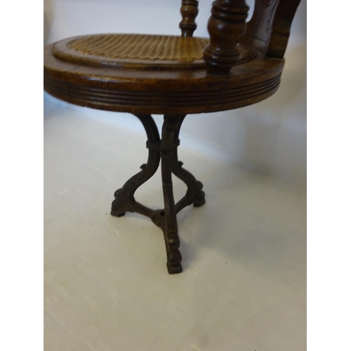 40 - Antique oak swivel ships chair on metal base, possibly from R.M.S Celtic which went up on the rocks ... 