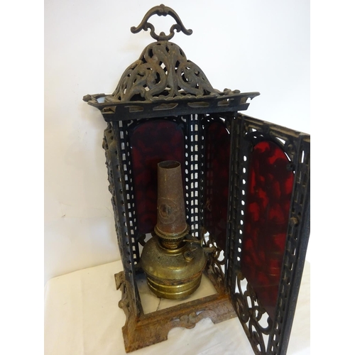 41 - Antique cast iron framed floor heater complete with original interior and registration number. H. 75... 