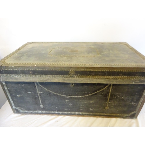 42 - Two antique leather and brass banded and studded trunks with carrying handles and name plate for Gou... 