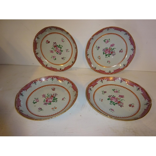 427 - A set of four antique Famille Rose circular dishes, one with chip.