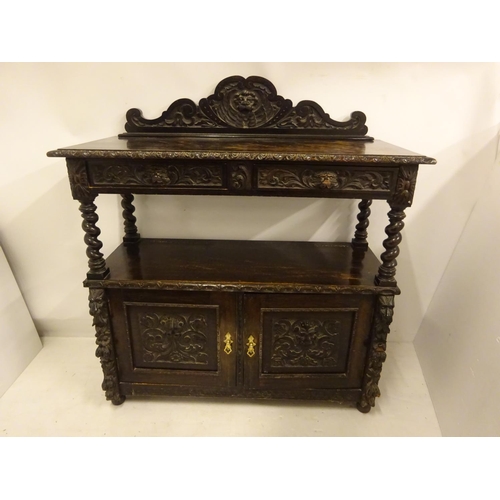 435 - 19th century carved oak side server fitted with drawers and cupboards. W. 125cm, D. 53cm, H. 110cm a... 