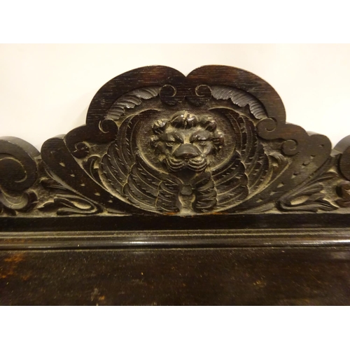 435 - 19th century carved oak side server fitted with drawers and cupboards. W. 125cm, D. 53cm, H. 110cm a... 