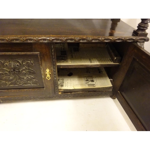 435 - 19th century carved oak side server fitted with drawers and cupboards. W. 125cm, D. 53cm, H. 110cm a... 