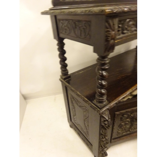 435 - 19th century carved oak side server fitted with drawers and cupboards. W. 125cm, D. 53cm, H. 110cm a... 