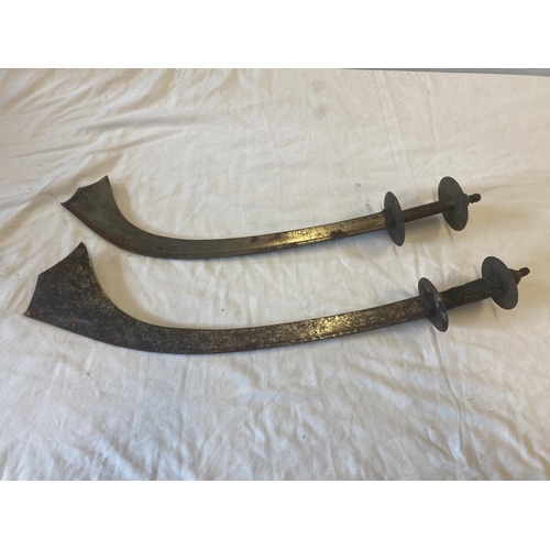 436 - Two Kora swords, Nepal/North India in need of some restoration. L. 67cm & 60cm.