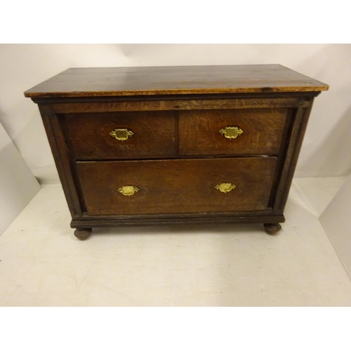 438 - Early antique oak chest of two short and one long drawer. W. 105cm, D. 50cm, H. 75cm approx.