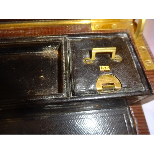 448 - A leather writing travelling box Capt. C. French, Hampshire Reg. together with a leather attache cas... 