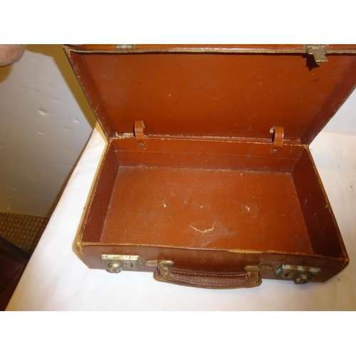 448 - A leather writing travelling box Capt. C. French, Hampshire Reg. together with a leather attache cas... 