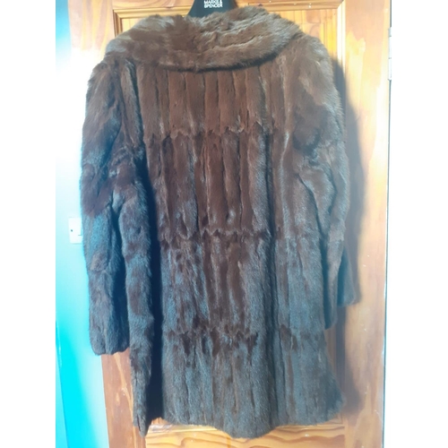 495 - A mink 3/4 length coat.