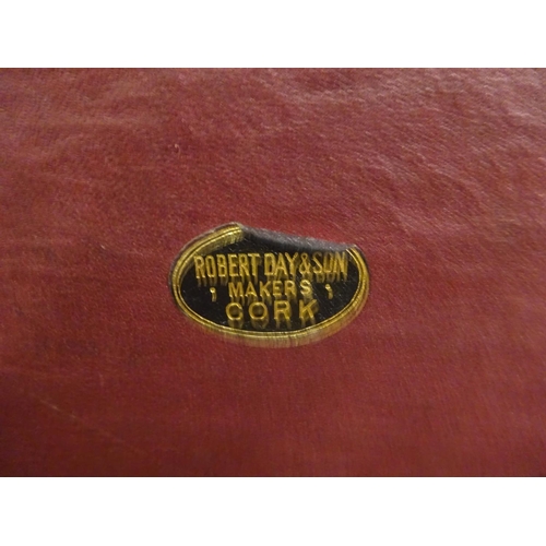 5 - Three suitcases and a top hat in case, the leather suitcase by Robert Day & Son, Cork, the top hat b... 