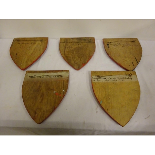 54 - Old family painted crests on shield shaped plaques - French-Dring, Goolden, Perry.