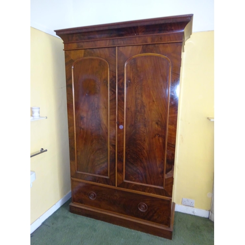 56 - Victorian mahogany two door wardrobe, the base fitted with a drawer. H. 216cm, D. 52cm, W. 130cm app... 