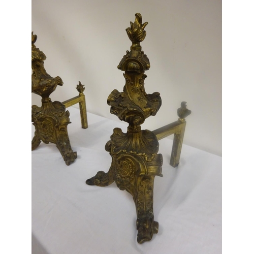 66 - Very good pair of antique brass fire iron rests.