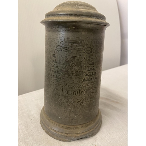 70 - A collection of 6 large lidded pewter tankards and 1 small tankard with interesting inscriptions. Th... 