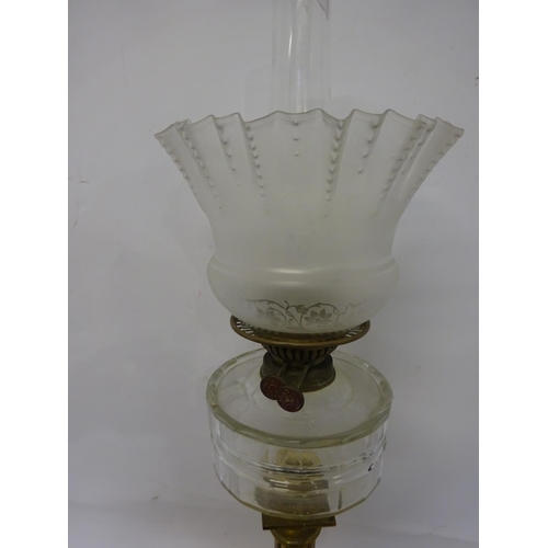 78 - Victorian tall brass column oil lamp with glass bowl and etched shade.