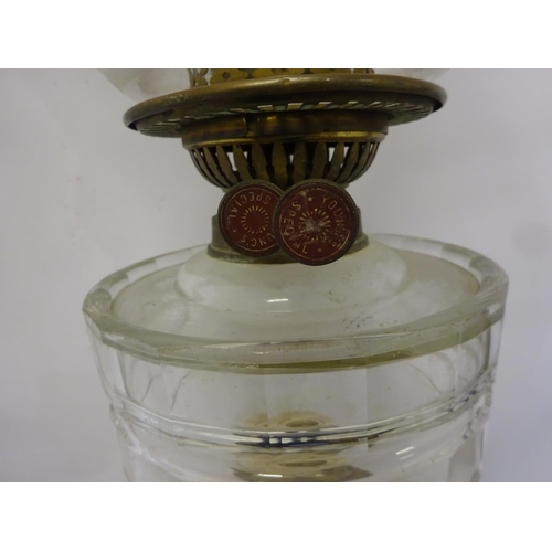 78 - Victorian tall brass column oil lamp with glass bowl and etched shade.