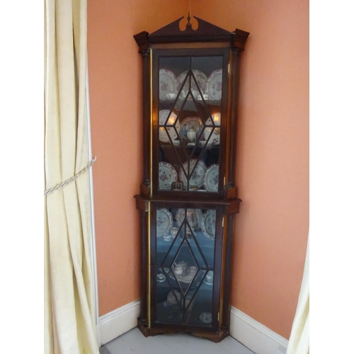 87 - 19th century mahogany corner cabinet with sectioned diamond glass doors and fluted columns. H. 220cm... 