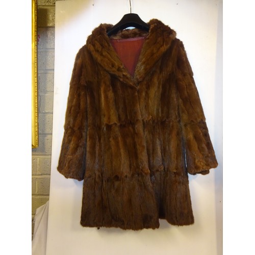 495 - A mink 3/4 length coat.