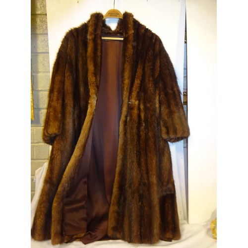 72 - Good quality full length fur coat.