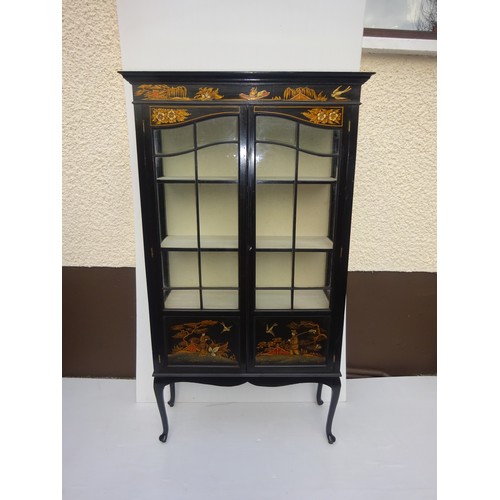 442 - Edwardian ebonized cabinet with oriental decoration. H. 169cm, W. 95cm, D. 35cm approx.