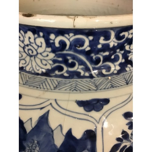 215 - A good pair of large antique Chinese blue and white baluster jars and covers, painted throughout wit... 