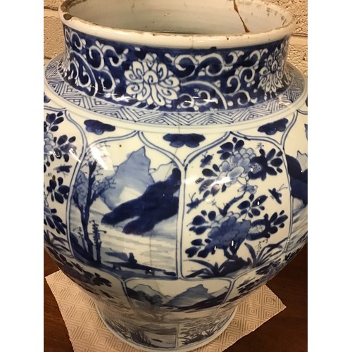 215 - A good pair of large antique Chinese blue and white baluster jars and covers, painted throughout wit... 