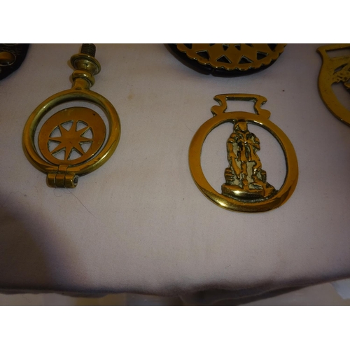 16 - A collection of old horse brasses.