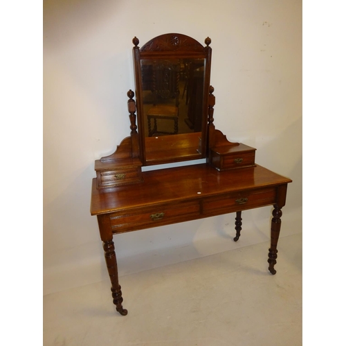 20 - Late Victorian mahogany dressing table. W. 116cm, D. 54cm.