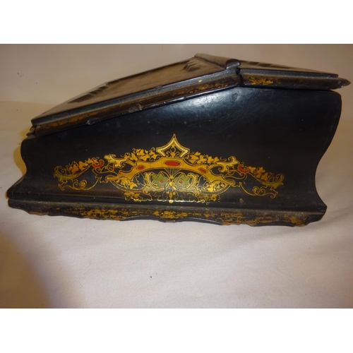 377 - A Victorian paper mache writing slope having landscape scenes and gilt decoration.