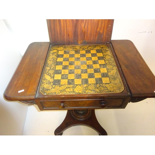 381 - Victorian mahogany games table raised on turned column and platform base. W. 76cm approx.