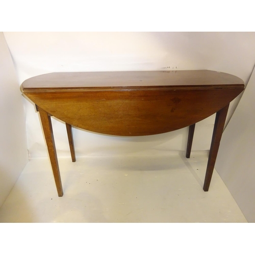 385 - Antique mahogany drop leaf table raised on tapered legs. L. 120cm, W. 95cm approx.