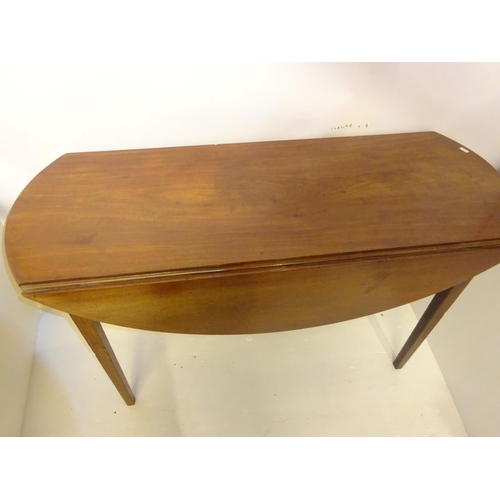 385 - Antique mahogany drop leaf table raised on tapered legs. L. 120cm, W. 95cm approx.