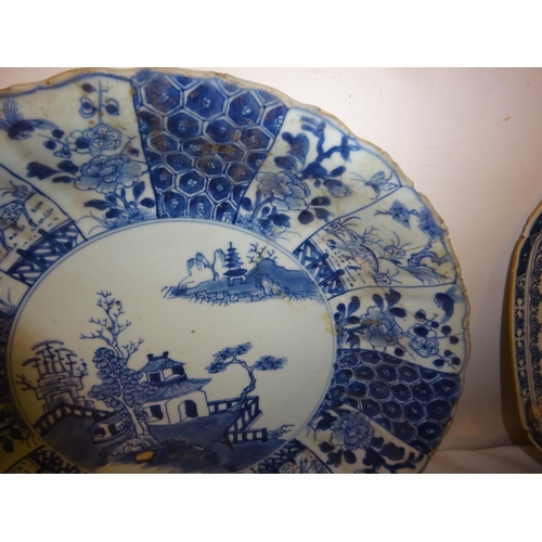 386 - Five old Chinese blue and white plates (some damage).