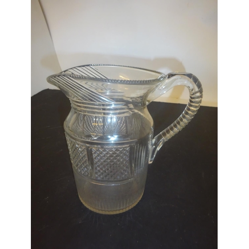 388 - Antique cut glass jug possibly Cork or Waterford. H. 18cm. (damaged, cracked)